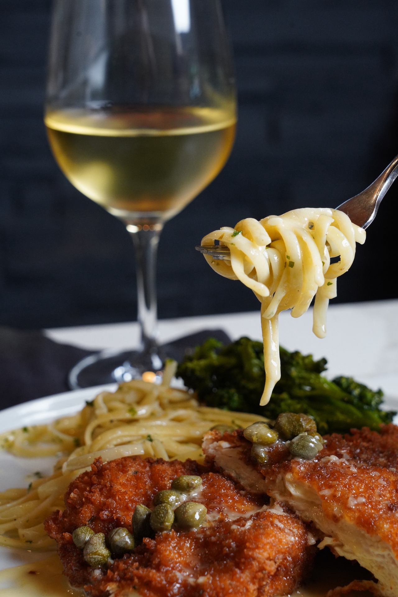 Crispy chicken Milanese with linguine