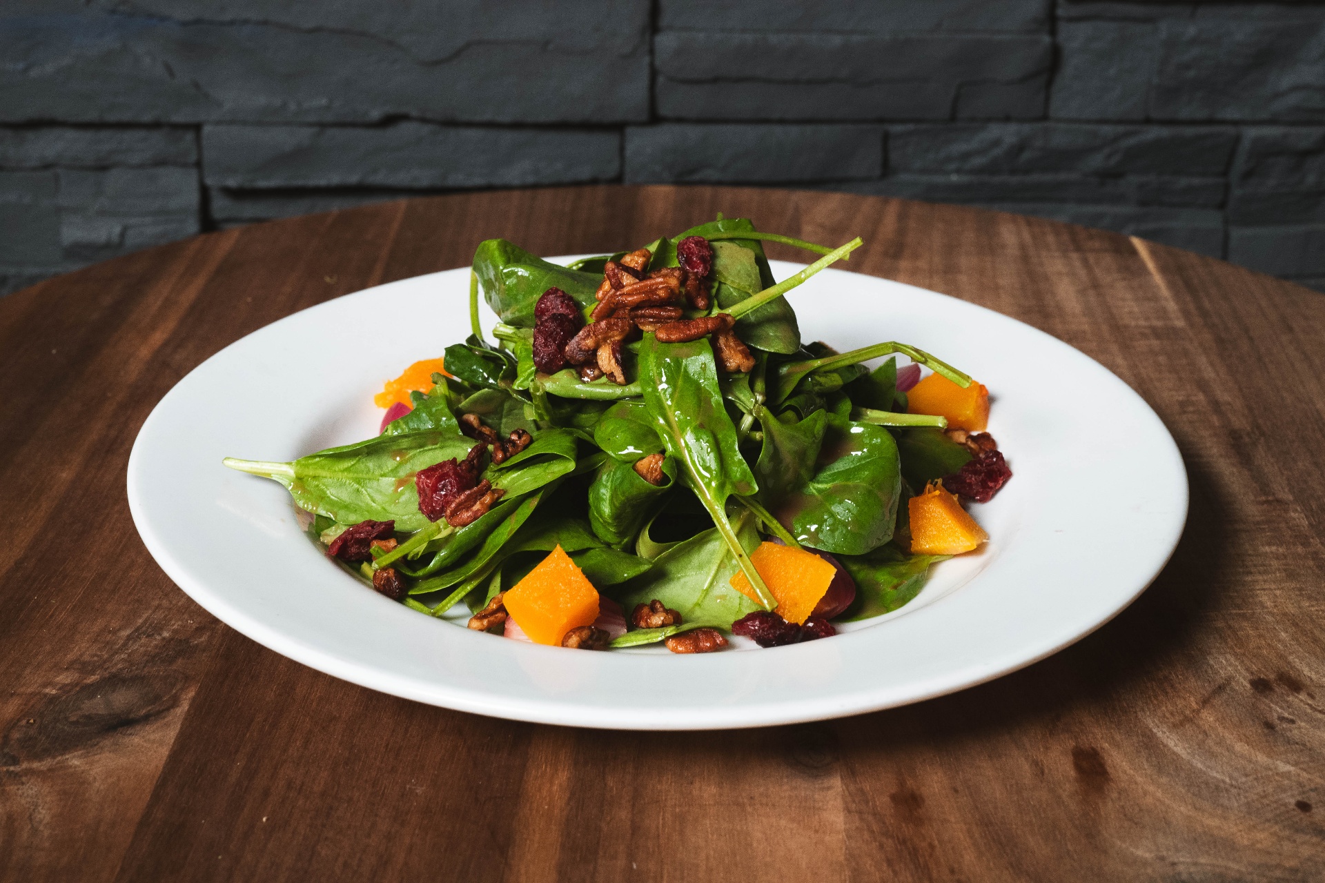 Spinach salad with pecans and cranberries