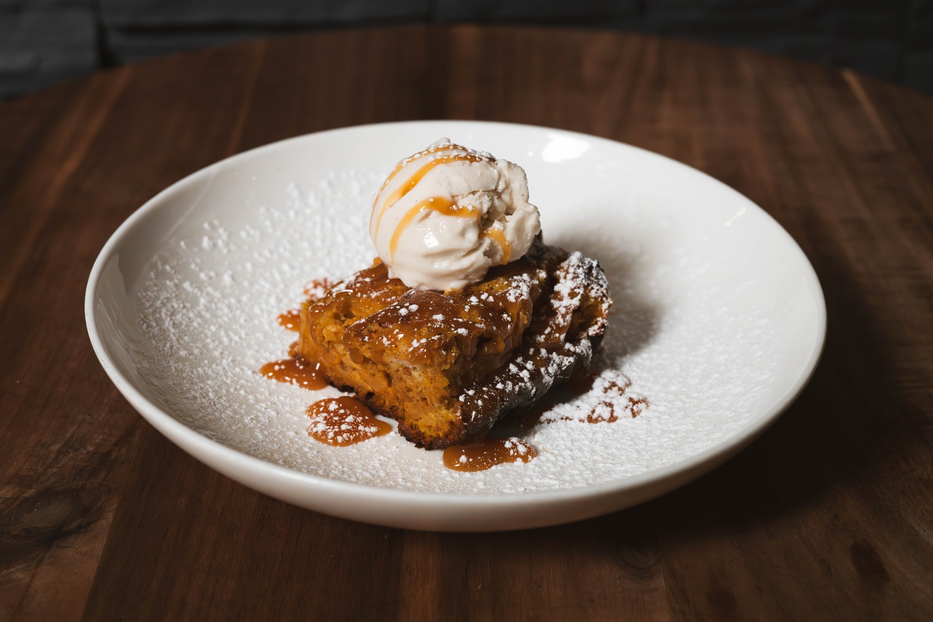 Bread pudding with caramel and ice cream